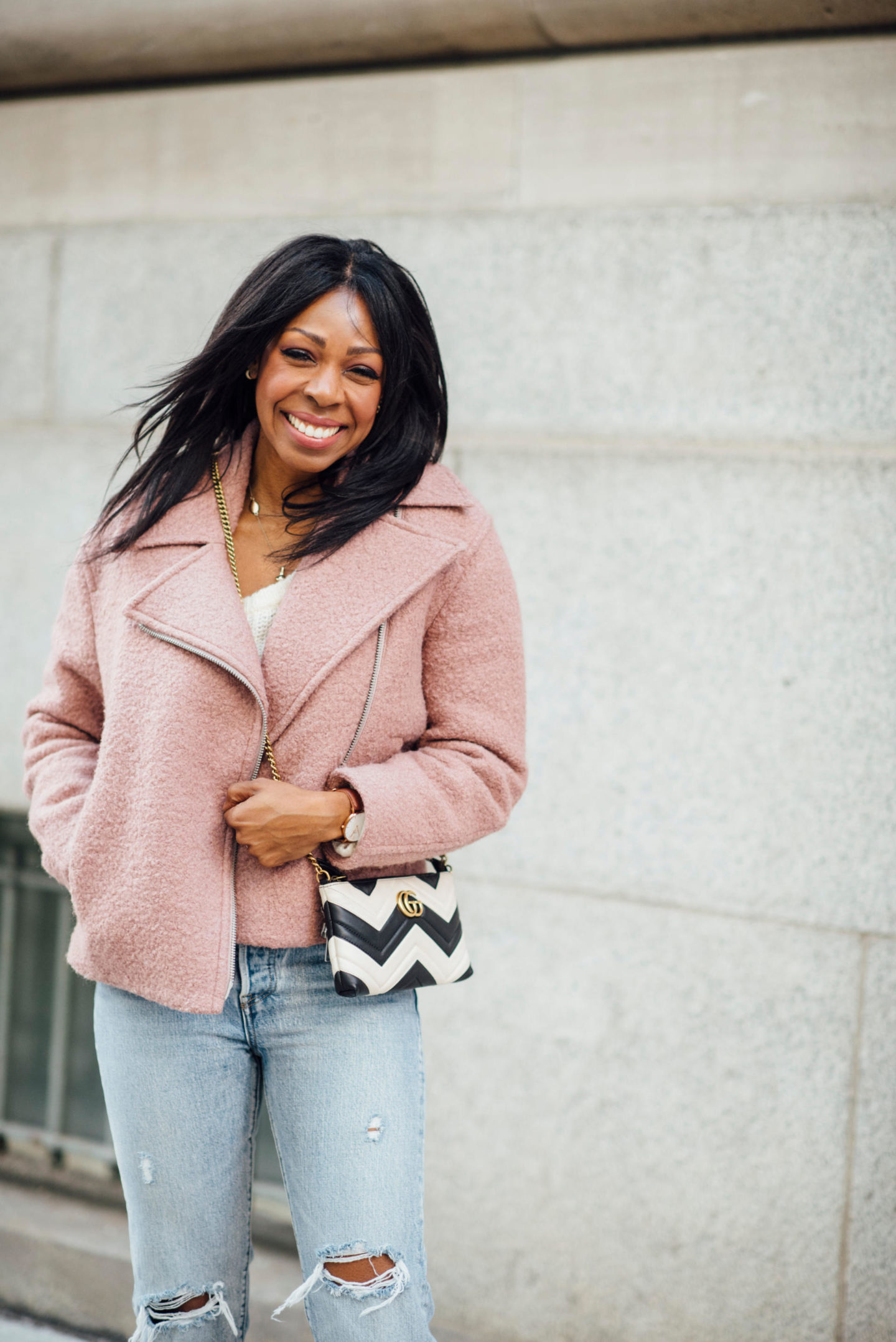Dominique Baker Wearing Pink Wool Moto Jacket Levi's Wedgie Jeans Gucci Marmont Bag Stan Smith Sneakers