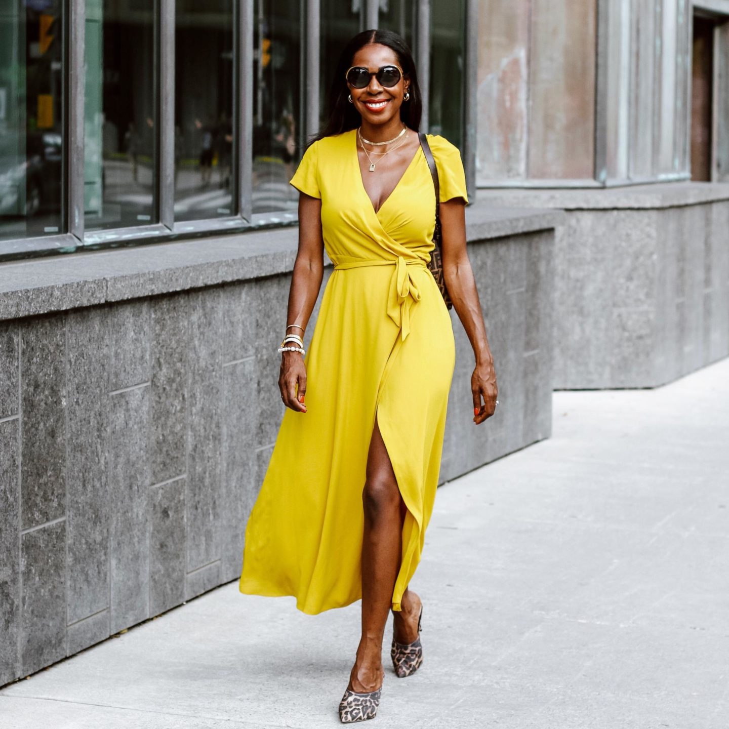 Dominique Baker Wearing a Yellow Dress walking through Ottawa
